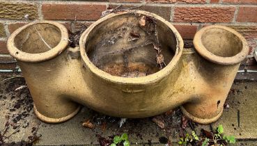 A 19thC three hole chimney pot. 72cm w x 33cm h.