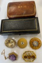 Five 19thC brooches to include pinchbeck , citrine, seed pearl and two leather covered jewellery