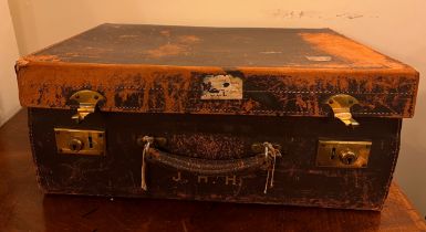 A vintage leather suitcase 52cm x 36cm x 18cm complete with four hallmarked silver lidded jars,