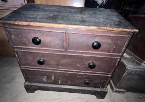 A 19thC pine dough bin with sloping lift up lid. The front made to resemble a chest of two short