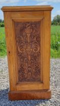 A 19thC oak pot cupboard with single carved door to the front. 100cm h x 50cm w x 44cm d.