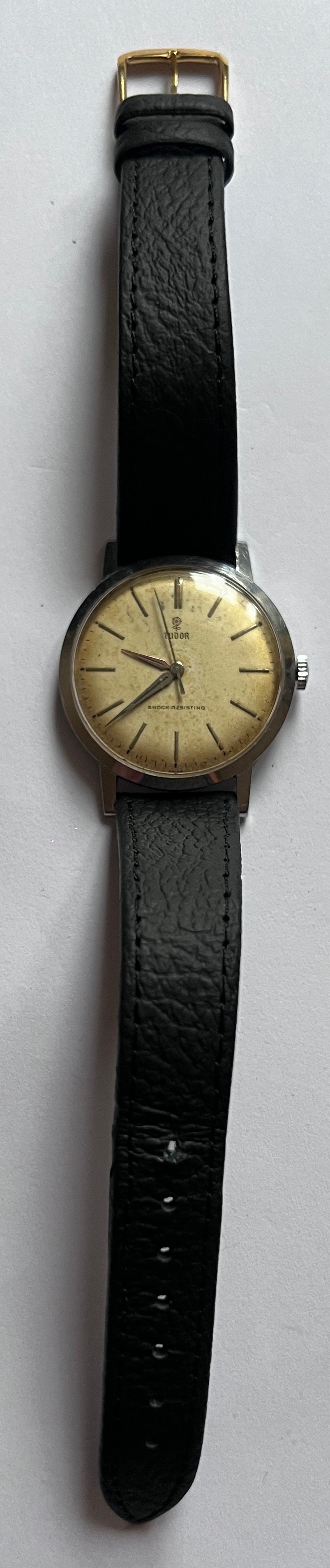 A 1950's Tudor shock resisting gentleman's wristwatch, gold numerals, gold hands on leather strap. - Image 2 of 3