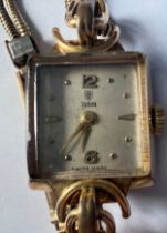 A vintage Tudor gold plated ladies wristwatch on gold plated strap. Case 17mm. Stamped to back