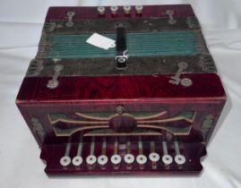 A Vintage accordion. 28cm x 25cm.