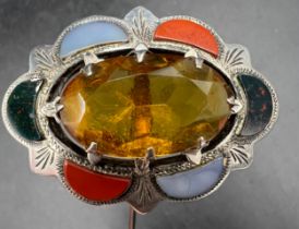 A Scottish sterling silver citrine and agate set hat pin. 5cm x 4cm. 22.5cm l.
