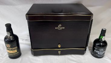 A Remy Martin cognac decanter box together with Calvares Port and a Royal Oporto 1977 vintage port.