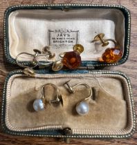 Three pairs of vintage screw on earring to include pearl and diamond set, contained within a vintage