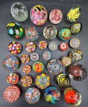 An assortment of paper weights to include millefiori, vintage etc, all unmarked. Various sizes,