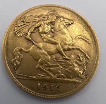 A George V 1912 half gold sovereign. 4gm.
