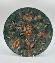 A large oriental painted display plate. 32cm d.