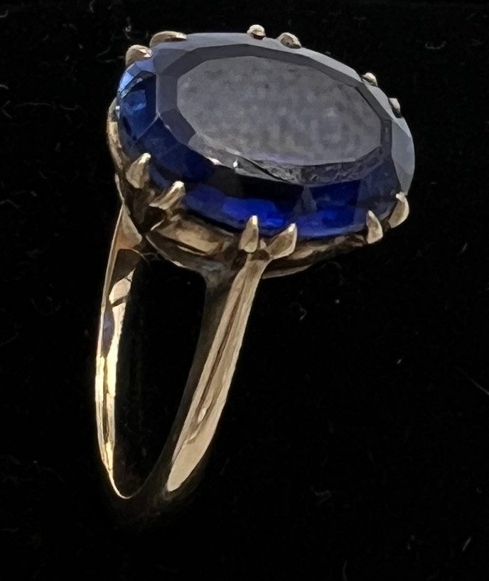 A 9 carat golds ring set with blue stone. Size N, weight 4gm. - Image 2 of 2