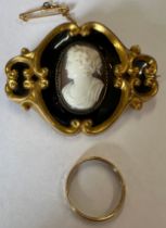 A 19thC mourning brooch with cameo surrounded by black enamel and gilt metal mount, 5cm x 4cm,