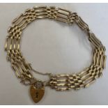 A 9 carat gold gate bracelet 8.5gm.