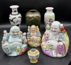 Oriental items to include three Chinese porcelain Buddhas with children, three vases to include