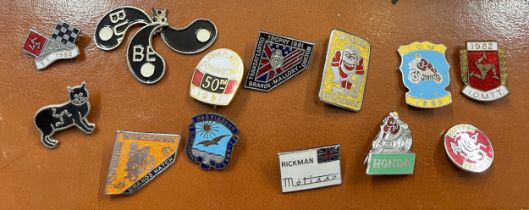 Thirteen various motorcycle badges to include Brands Hatch 1981, Dresda racing, T.T 1982 etc.