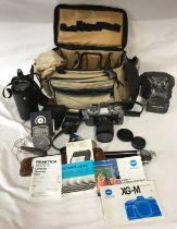 Collection of photographic equipment to include a Minolta camera and case, Hoya HMC Zoom Lens in