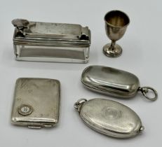 An assortment of silver items to include a screw down travelling inkwell London by Thomas Diller,