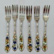 A set of six Dutch white metal and enamelled cake forks marked with a P and R with a horses head, (