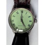 A 1940's gentleman's Tudor Oyster Shock Resisting wristwatch on brown leather strap and green