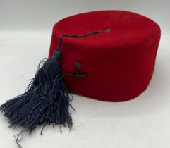 Royal West African Frontier Force Fez with tassel and badge.