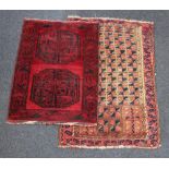 Two small rugs to include a Persian rug, red ground with two black medallions 88cm by 67cm (a/f)