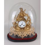 A French gilt metal figural mantle clock, with white enamel dial set with Roman numerals above