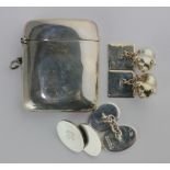 A pair of silver cuff links with oval backs and fronts, Birmingham 2000, a pair of silver cuff links