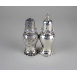 A pair of modern silver salt and pepper pots baluster shape with gadrooned borders, London 1970, 5.