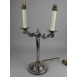 Navy interest, a silver plated two-branch candelabra converted to a table lamp, with fouled anchor