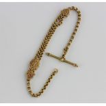 A Victorian gold dress Albert chain in a multiple link design, with applied bead and wirework