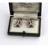 A pair of ruby and opal scorpion earrings, set in 9ct rose gold, with screw fittings, in a fitted