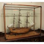 A model of HMS Victory, the flagship of Admiral Lord Nelson, in mahogany glazed case, case 87cm by