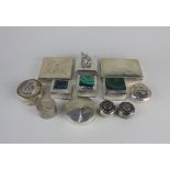 A collection of silver and other metal dressing table boxes to include one with a malachite top