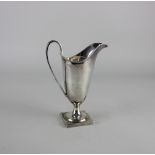 A George VI silver cream jug neo-classical style, on square base, maker Viners, Sheffield, 1937, 3.