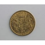 A Queen Victoria gold sovereign dated 1864