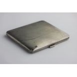 A silver rectangular cigarette case with engine turned decoration, Birmingham 1937, 4.4oz