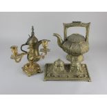 A brass desk stand with a pair of lidded inkwells and pen rest on rectangular base 25.5cm, a gilt