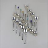 A set of six George V silver coffee spoons with seal style terminals, maker Mappin & Webb