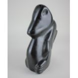 A Zimbabwean carved and polished stone sculpture of an ape the underside signed Cammady Mandizvidza,
