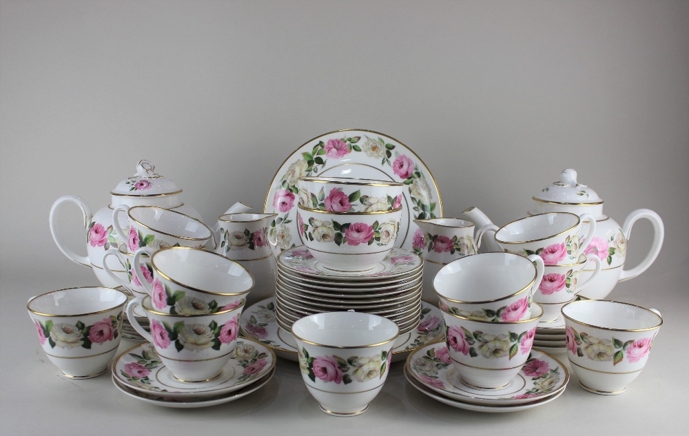 A Royal Worcester porcelain 'Royal Garden Elgar' pattern part tea service decorated with pink and