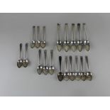 A set of five George V silver grapefruit spoons Sheffield 1928, set of six silver coffee spoons,