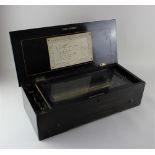 A 19th century Swiss eight airs musical box with label inscribed 'Fabrique de Geneve 22888 1089', in
