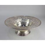 A sterling silver circular pierced bowl with central engraved initials on circular base, 13.6oz