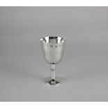 A Queen Elizabeth II silver goblet hammered bowl on cylindrical beaded stem and circular base,
