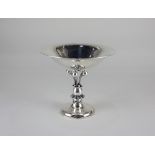 A Danish sterling silver pedestal bowl by Holger Rasmussen with beaded baluster stem and circular