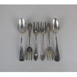 A set of four sterling silver cake forks stamped EP Roberts & Sons, engraved initials and a pair