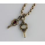 A gold faceted oval link long guard chain detailed 9c, fitted with two Victorian gem set gilt