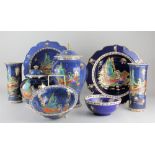 A collection of 'Blue Lagoon' Arcadian ware printed and painted with a scene of Hiawatha in a canoe,