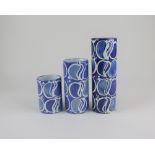 Three Royal Copenhagen Ellen Malmer cylinder vases each with repeat pattern on blue ground,