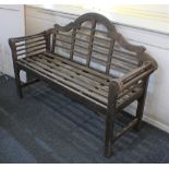 A garden bench with slatted seat and dome back, 130cm